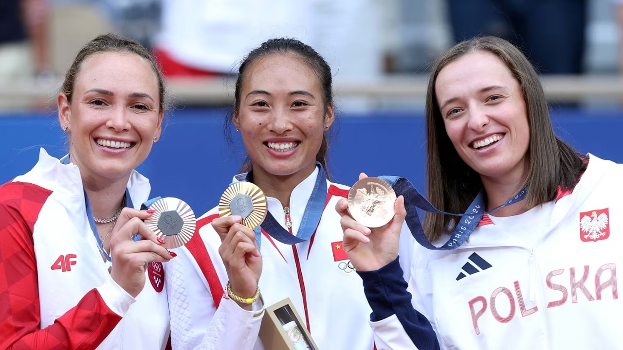 China’s top athletes at the 2024 Paris Olympics winning gold medals in swimming, tennis, and artistic swimming.