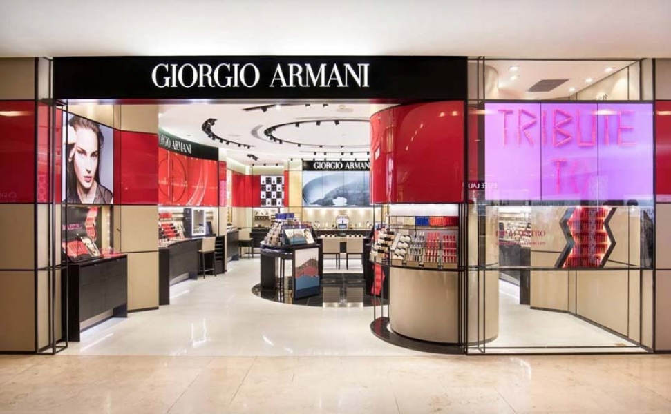 Armani Beauty and eyewear displays highlighting licensing and margin support during the transition