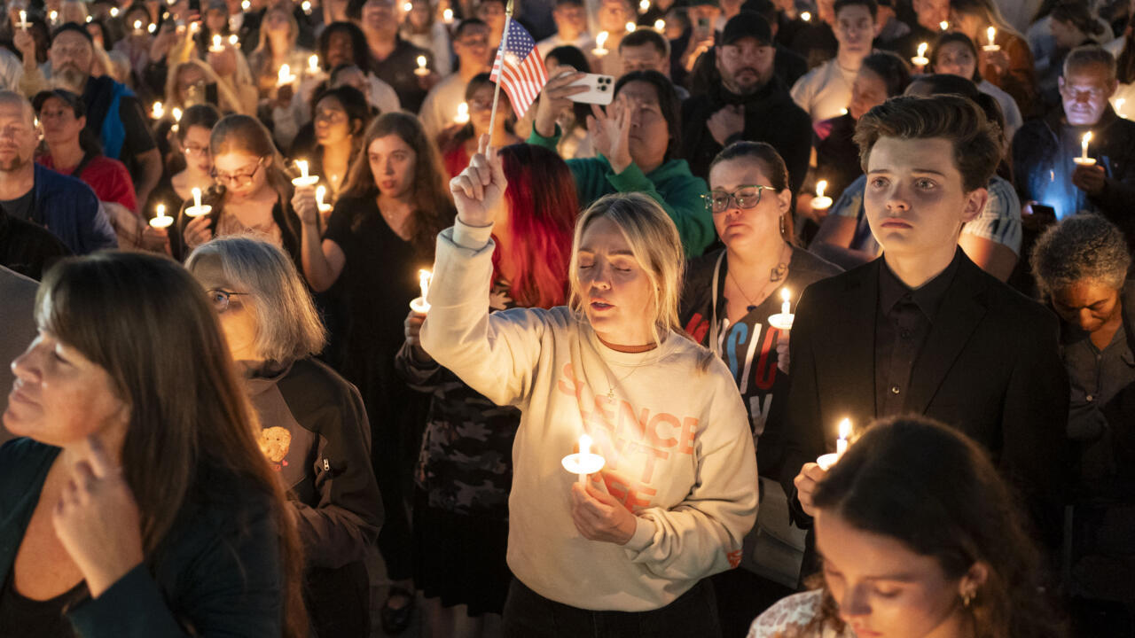 Students hold candles at a vigil on the Utah Valley University campus in Orem after the shooting of Charlie Kirk. Students hold candles at a vigil on the Utah Valley University campus in Orem after the shooting of Charlie Kirk.