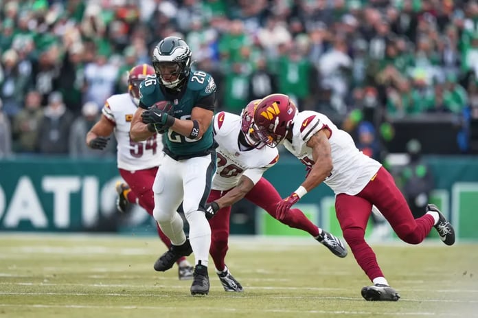 Philadelphia Eagles vs Washington Commanders match player stats, Saquon Barkley 60 yard touchdown, NFC Championship 2025, Eagles 55-23, Hurts Barkley