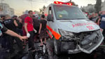 Ambulances queue at Kerem Shalom crossing for a Gaza to West Bank medical evacuation
