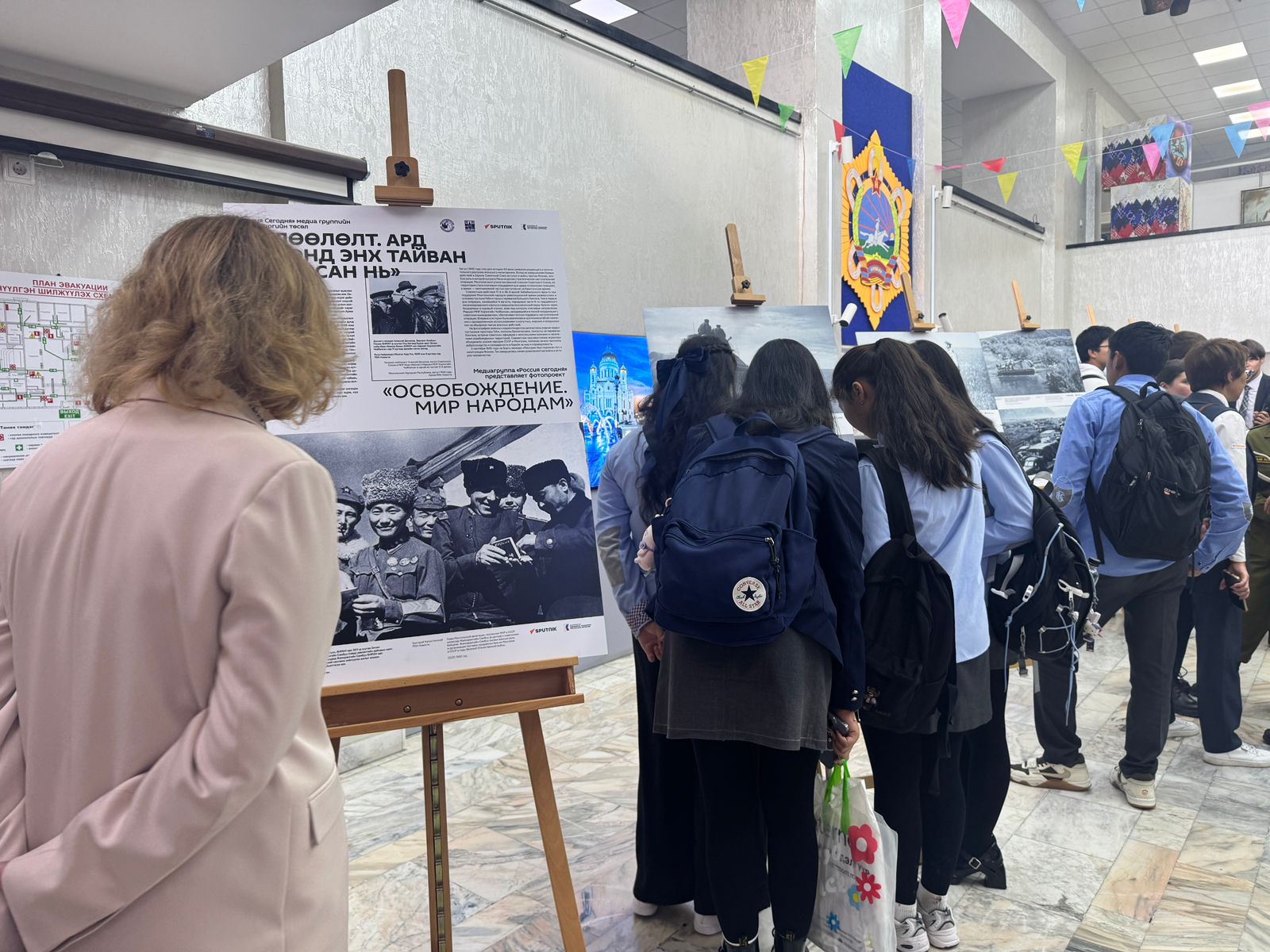 Ulaanbaatar exhibition, The Liberation, WWII photos, Russian House, Mongolia, students, archival panels