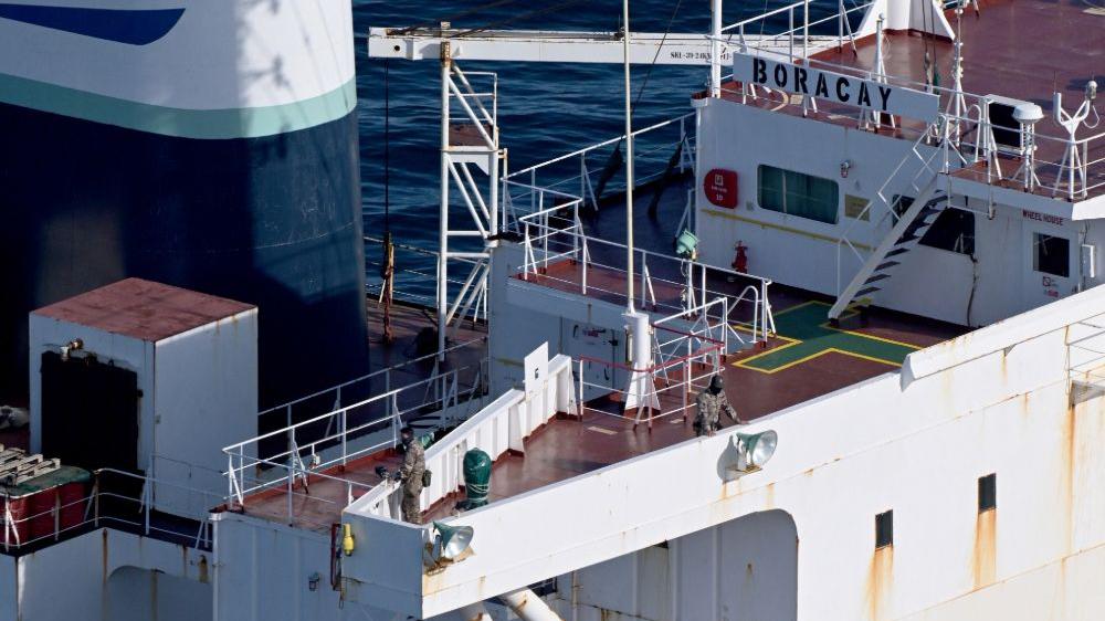 French maritime police near a detained oil tanker off Saint-Nazaire