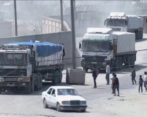 Aid trucks line up at Rafah crossing as corridor schedules are prepared under the first phase ceasefire