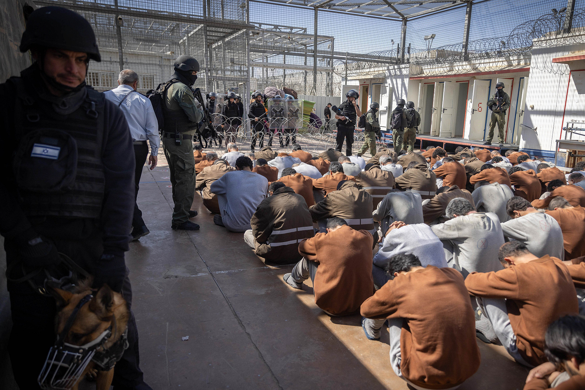 Watchtower and perimeter wall of Ofer Security Prison near Ramallah, an Israel Prison Service facility central to detainee intake