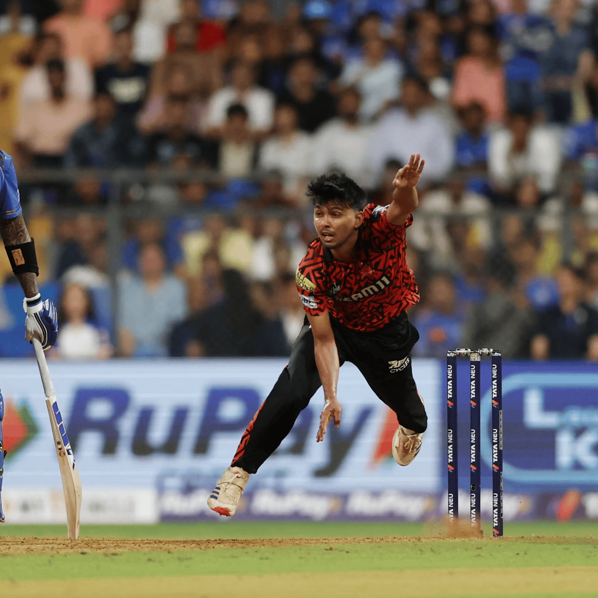 ODI cricket bowler delivering ball during ICC Super League match