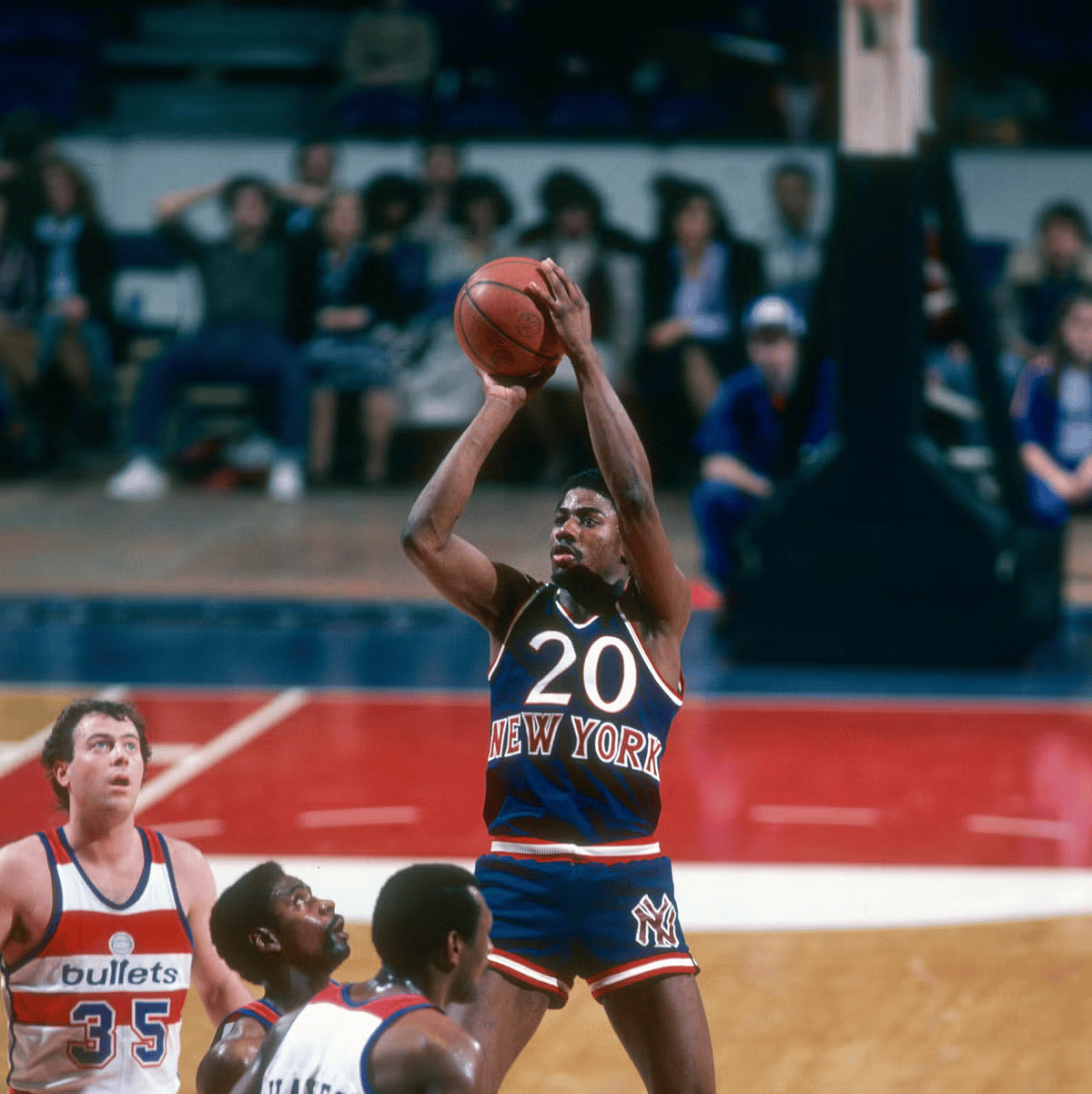 Michael Ray Richardson playing for the New York Knicks in an NBA game