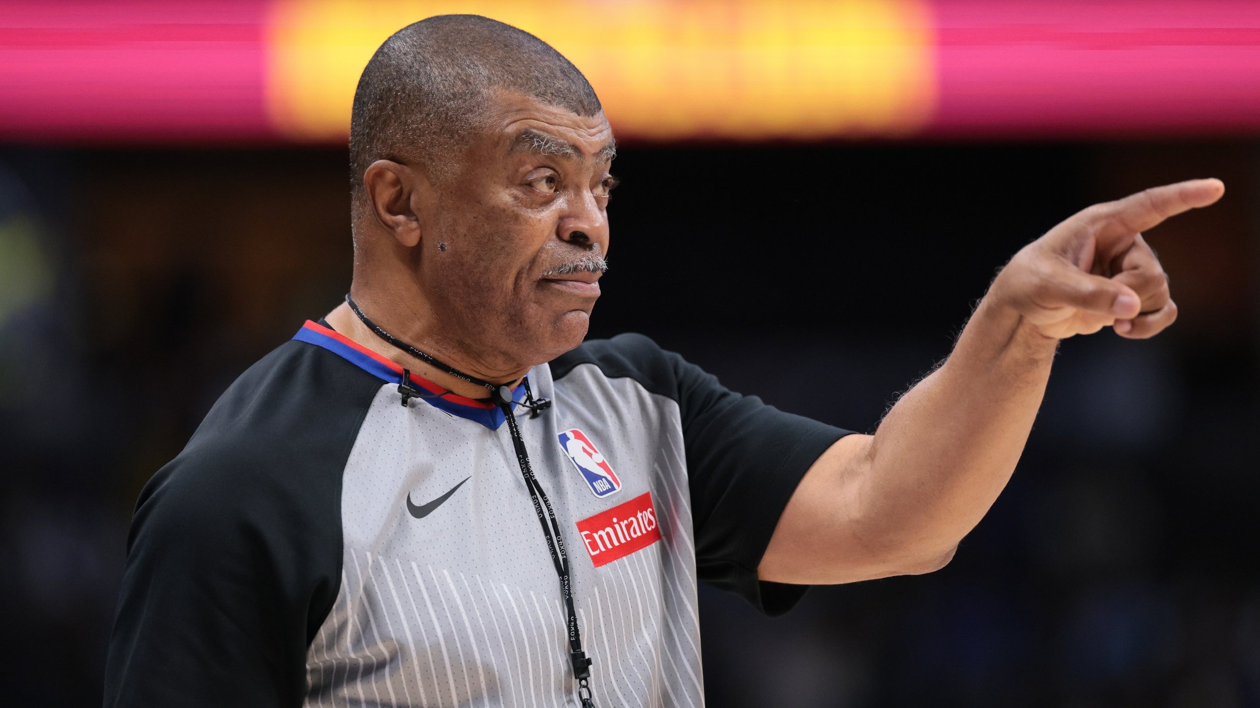 NBA referee using communication headset during 2025 season game