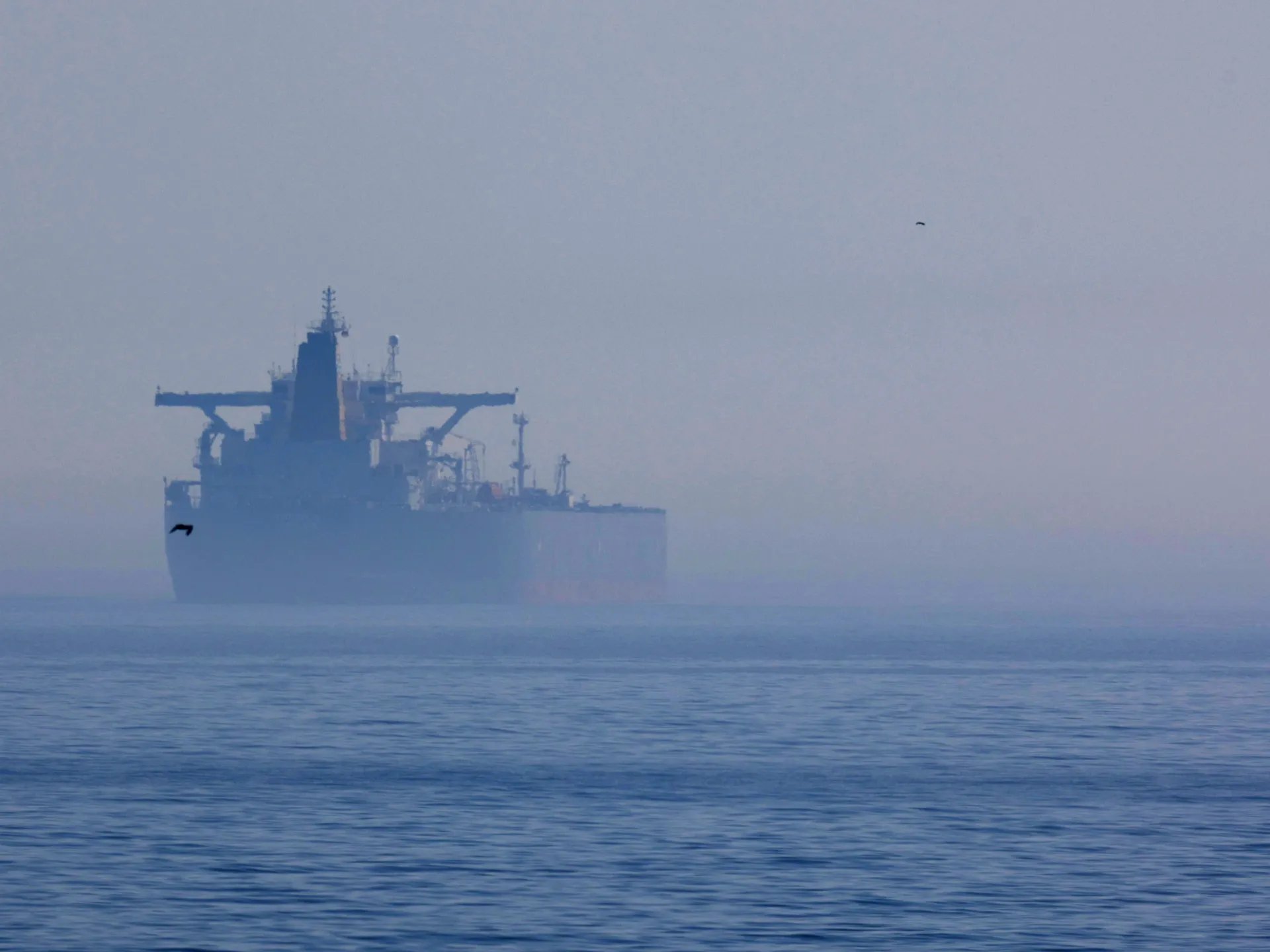 Ukrainian maritime drone striking Russian shadow fleet oil tanker in Black Sea during Russia-Ukraine war day 1386
