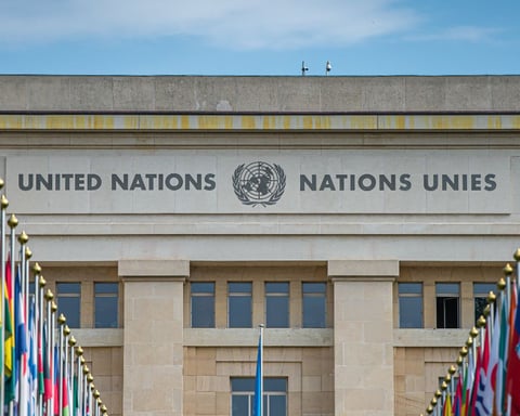 UN Security Council building with veto symbol highlighting global paralysis