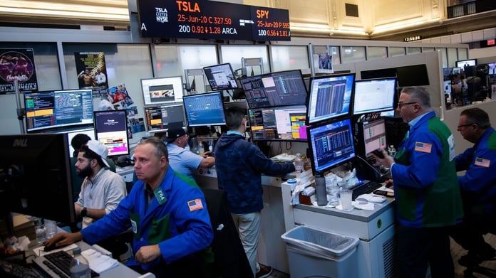 Dow rises while Nasdaq falls amid Iran war market volatility