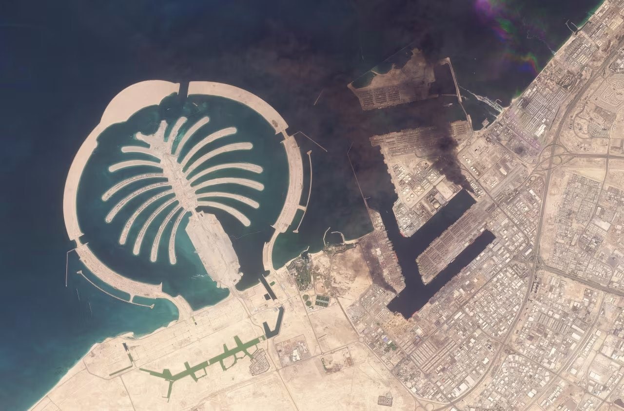 Debris and smoke after an Iranian drone or missile strike in the Gulf region