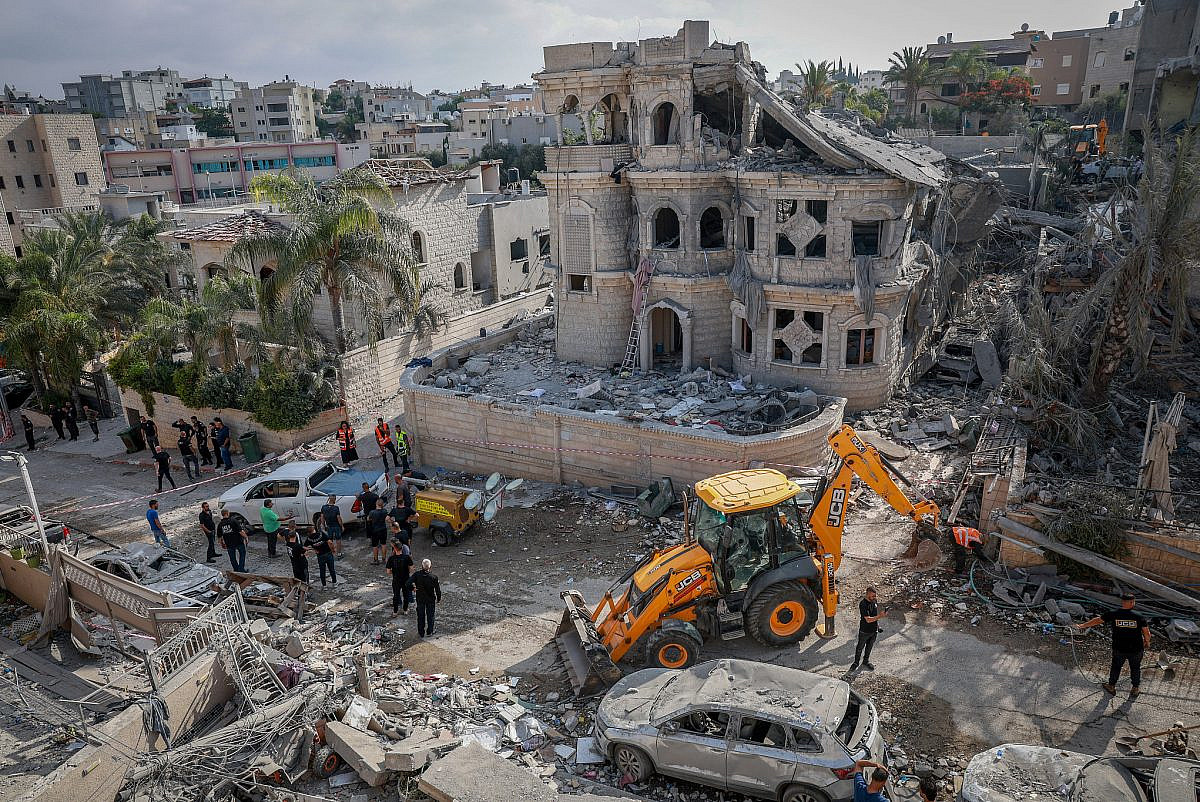 Iranian missile strikes causing widespread damage across Israeli cities in 2026 war escalation