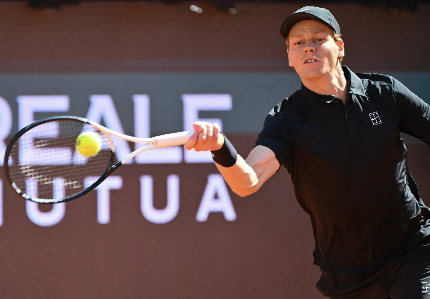 Jannik Sinner playing a forehand against Andrea Pellegrino during Italian Open 2026 match in Rome