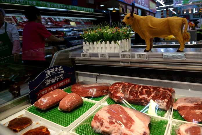 Beef on display at a Beijing market as China imposes a 55% tariff on Australian beef imports above quota