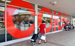 Shoppers walk through a Coles supermarket amid Australia fake discount pricing controversy