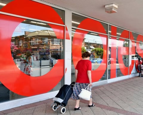 Shoppers walk through a Coles supermarket amid Australia fake discount pricing controversy