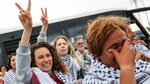 Israeli minister Itamar Ben-Gvir watches detained Gaza flotilla activists kneeling at Ashdod port