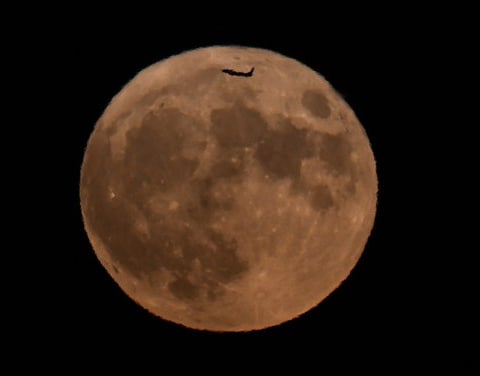 A super Blue Moon rises over the Golden Gate Bridge in San Francisco on August 30, 2023