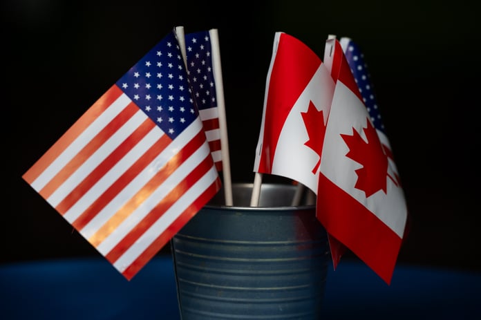 Canadian and American flags at the Rainbow Bridge U.S.-Canada border crossing in Niagara Falls