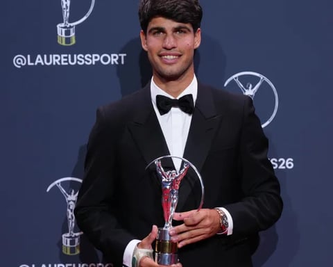 Carlos Alcaraz reacts during a match after wrist injury forces Wimbledon withdrawal in 2026