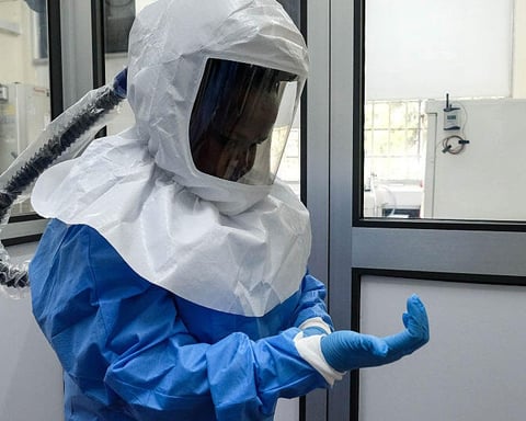 Laboratory technologist in protective equipment at Uganda Virus Research Institute in Entebbe Uganda during Ebola outbreak 2026