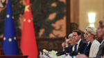 EU and Chinese flags at a summit as the EU weighs China trade curbs over industrial overcapacity