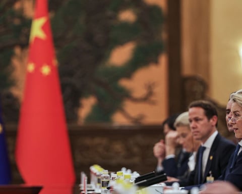 EU and Chinese flags at a summit as the EU weighs China trade curbs over industrial overcapacity