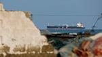 Oil tankers pass through the Strait of Hormuz amid worsening Gulf supply disruptions and rising global energy fears