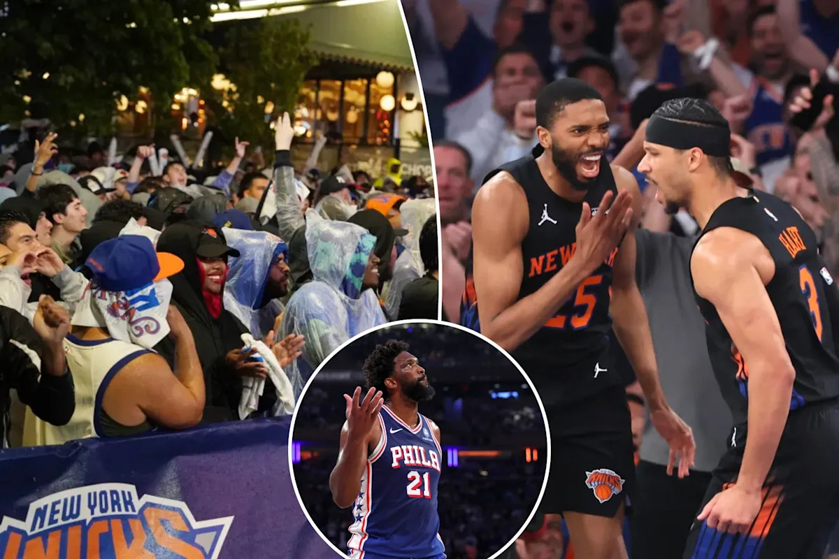 Knicks fans celebrate inside the 76ers arena during playoff sweep