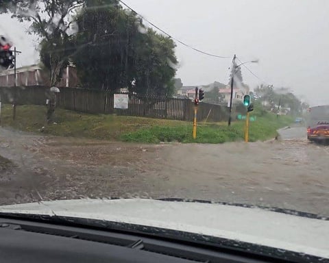 Residents navigate flooded streets after heavy rainfall in KwaZulu-Natal