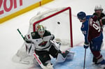 Colorado Avalanche players celebrate Brett Kulak overtime goal against Minnesota Wild in Game 5 playoff comeback