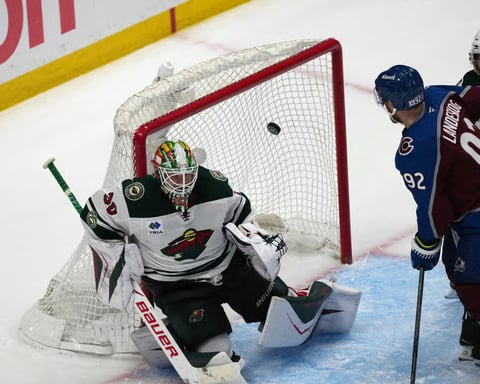 Colorado Avalanche players celebrate Brett Kulak overtime goal against Minnesota Wild in Game 5 playoff comeback