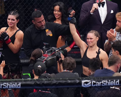 Ronda Rousey celebrates after defeating Gina Carano during Netflix's record-setting MMA event