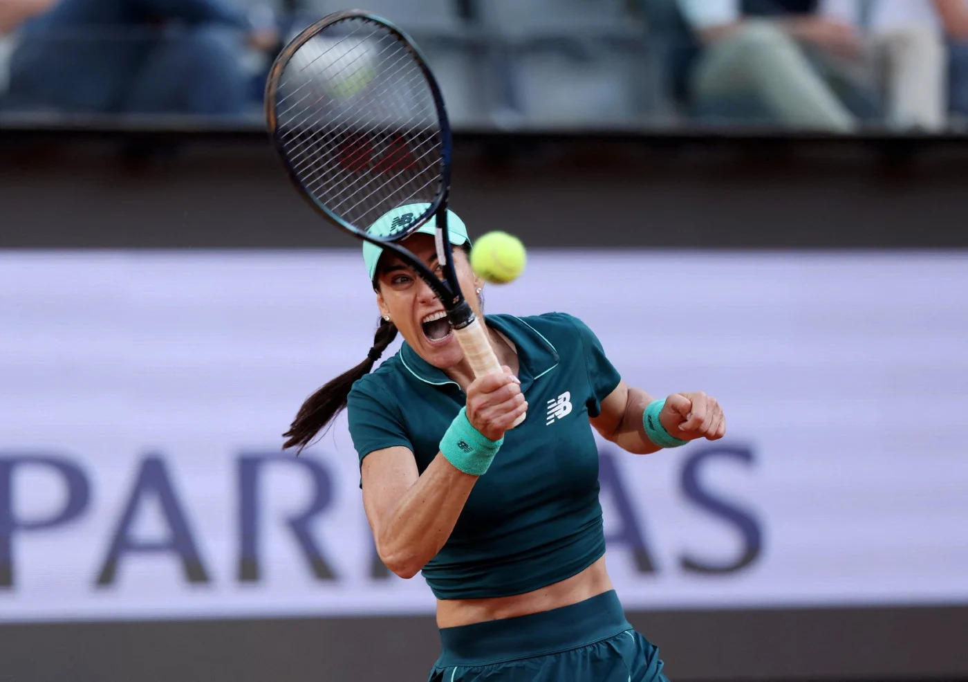 Sorana Cirstea celebrates after defeating Aryna Sabalenka in Rome