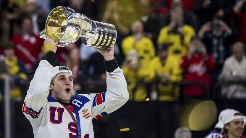 Team USA players celebrate after winning the 2025 IIHF World Championship