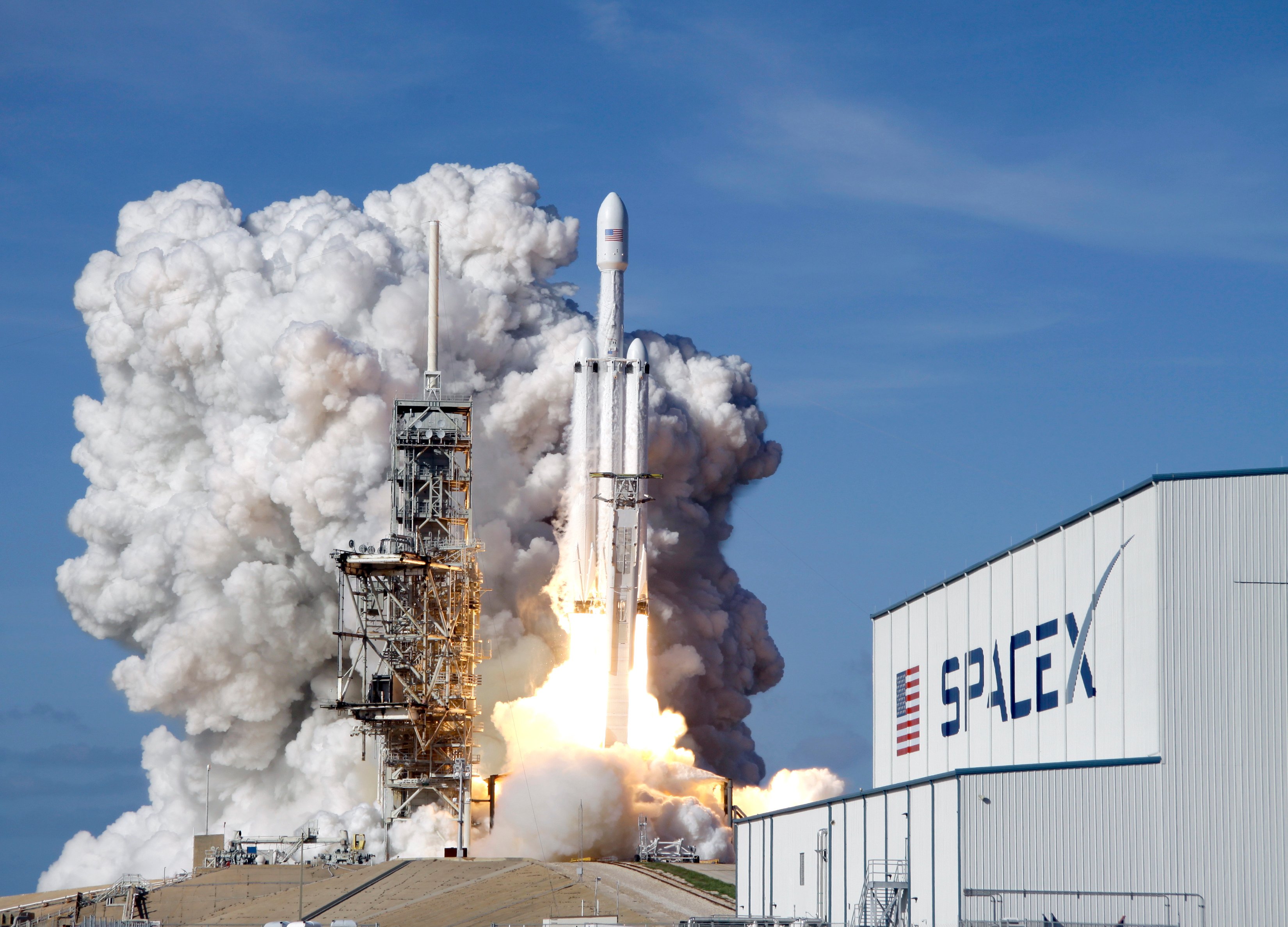 A SpaceX Falcon 9 rocket lifts off as US tech and space valuations surge amid the AI boom
