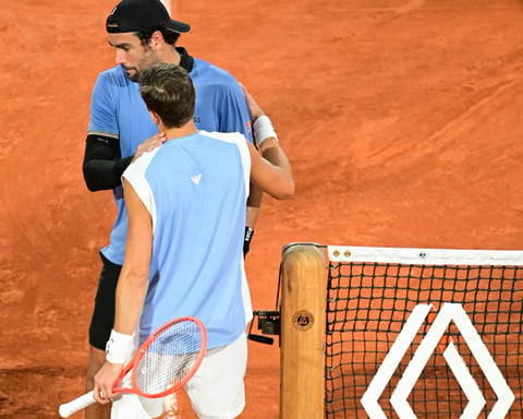 Matteo Berrettini and Matteo Arnaldi during the Roland Garros 2026 quarterfinal on Court Philippe-Chatrier