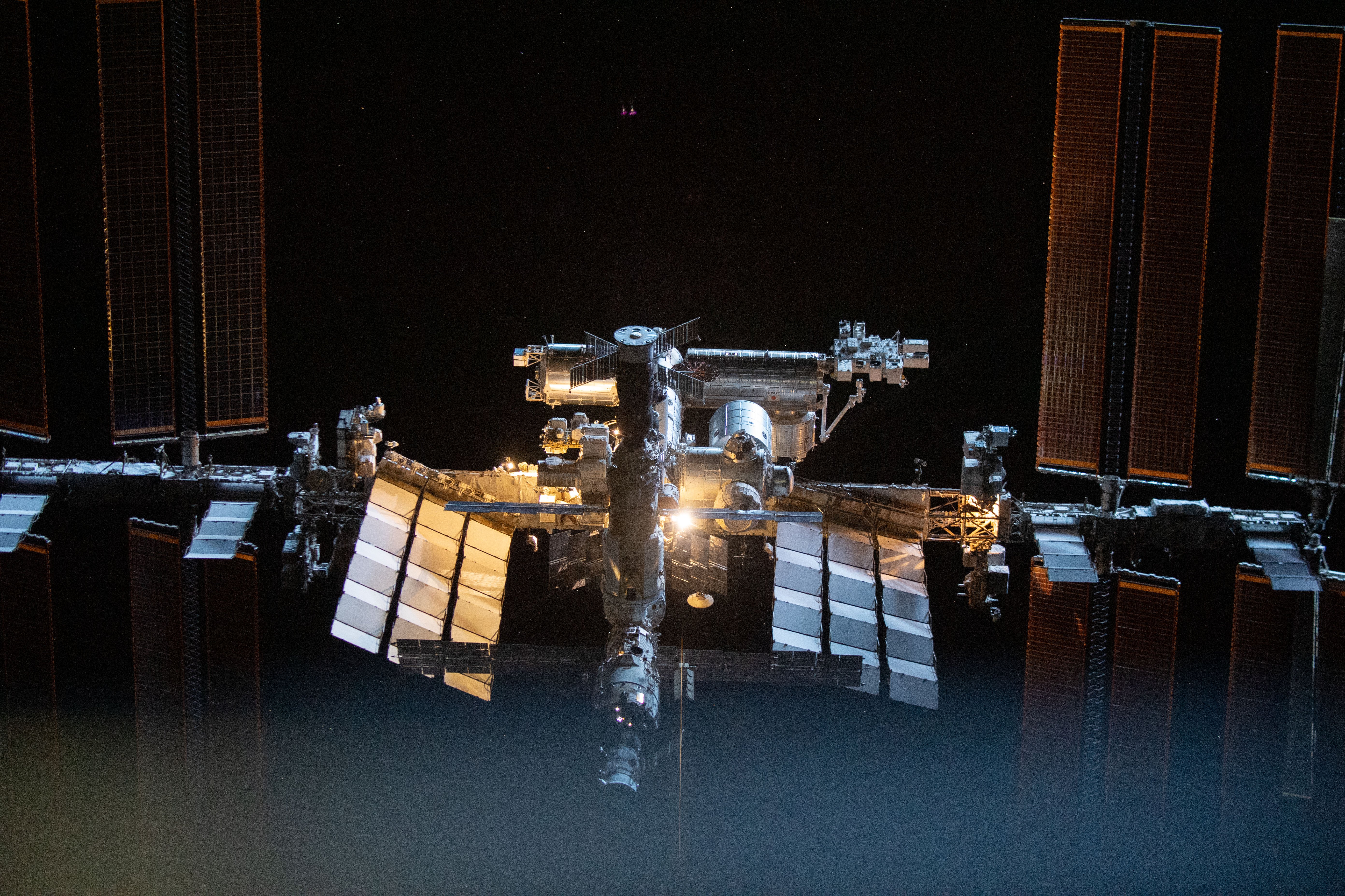 International Space Station photographed from SpaceX Crew Dragon spacecraft during fly-around maneuver in orbit