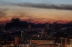 Smoke billows over Kyiv apartment buildings after Russian missile and drone strike June 2 2026