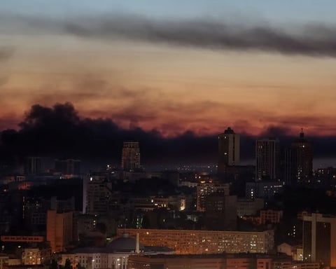 Smoke billows over Kyiv apartment buildings after Russian missile and drone strike June 2 2026