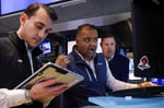 Traders work on the floor of the New York Stock Exchange on June 5 2026 as May jobs report fuels Fed rate hike bets