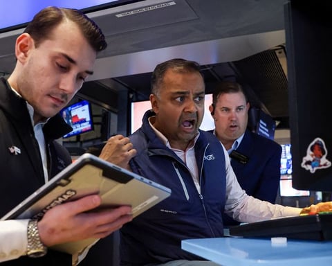 Traders work on the floor of the New York Stock Exchange on June 5 2026 as May jobs report fuels Fed rate hike bets