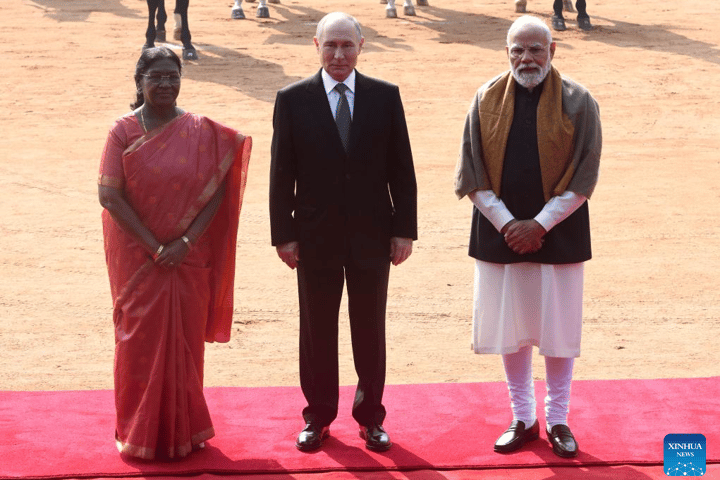 Russian President Vladimir Putin, Indian President Droupadi Murmu and Indian Prime Minister Narendra Modi pose for a group photo during a welcome ceremony in New Delhi, India, December 5, 2025