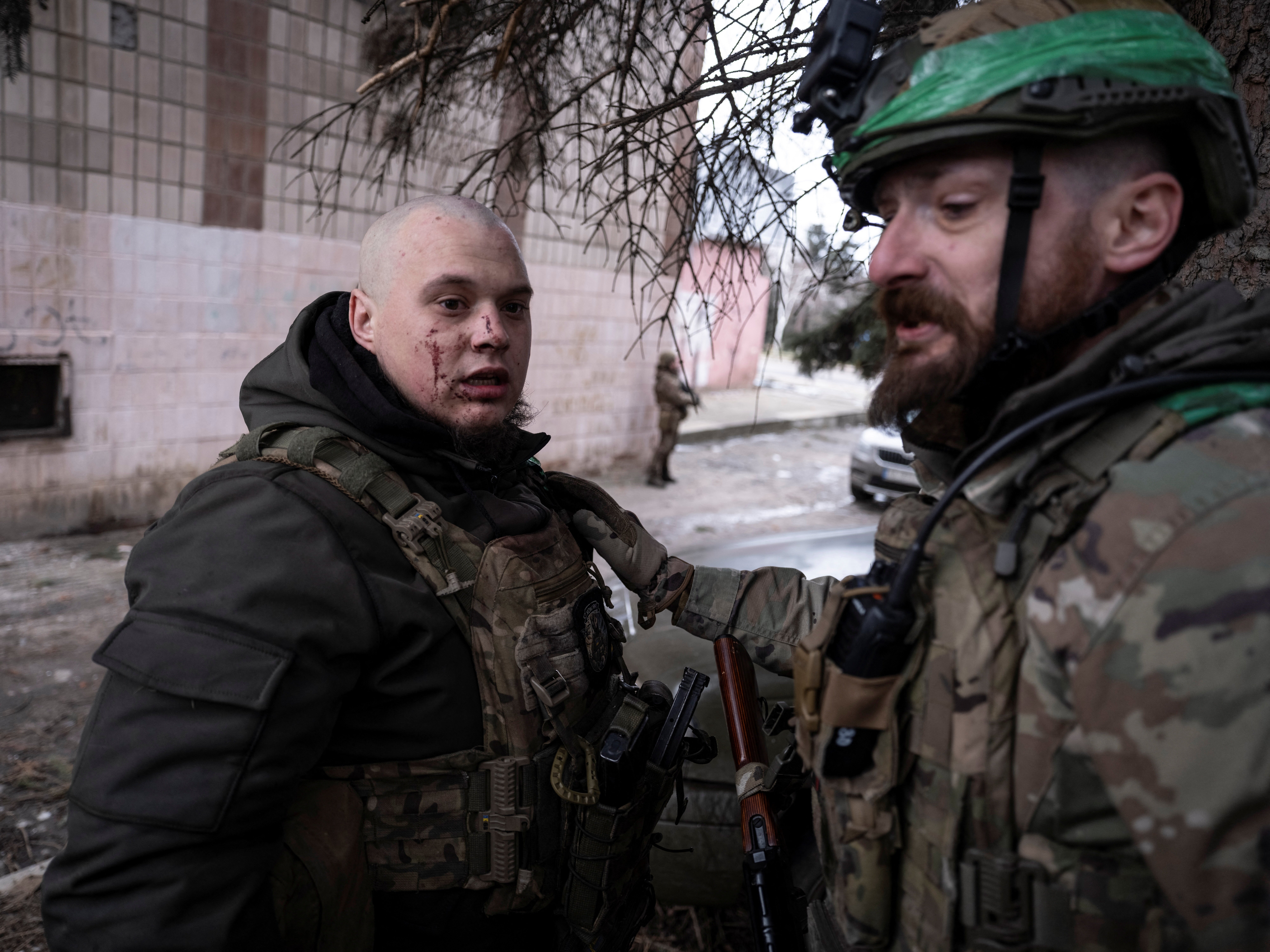 Ukrainian soldier assists injured comrade during medical evacuation Druzhkivka Donetsk region February 2026
