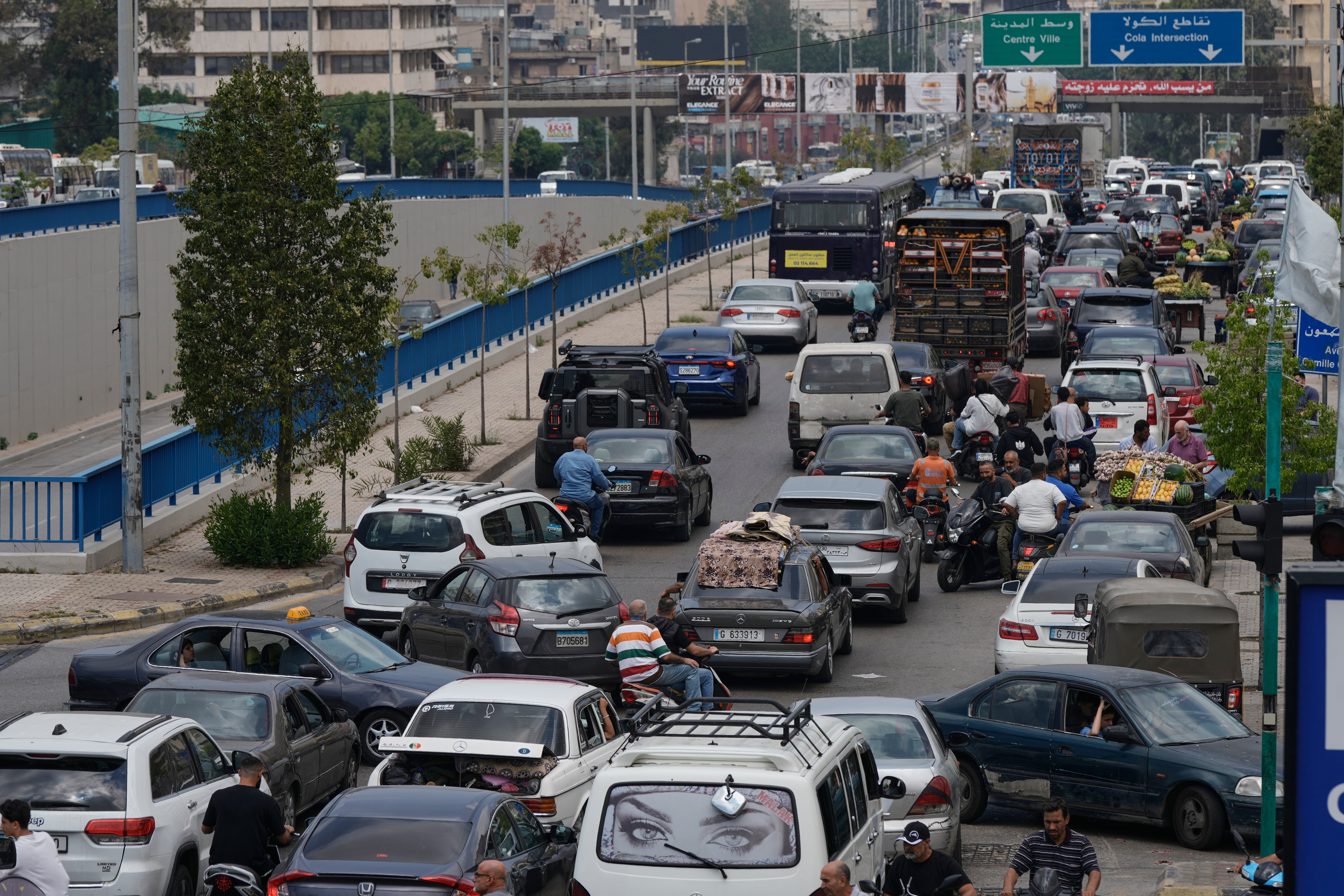 Lebanese residents flee south Beirut on June 1, 2026 as Israel orders strikes on Dahiyeh amid UN calls for diplomatic push