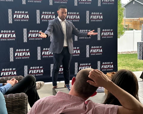Utah state Rep. Doug Fiefia speaks to Republican voters at a cottage meeting in Riverton, Utah, in April 2026